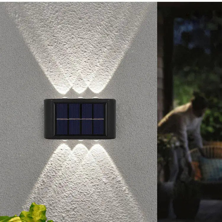 Hot sale IP65 waterproof polysilicon solar panel white light warm light up and down light source solar LED wall lamp hotel